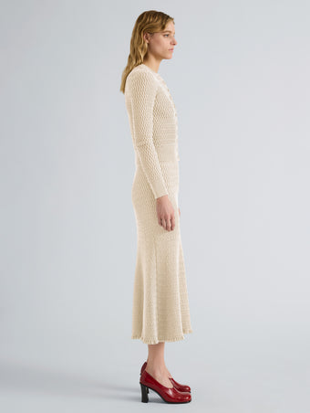 Proenza Schouler Side full length image of model wearing Marci Cardigan in Cable Knit in Vanilla