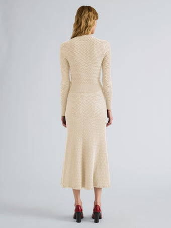 Proenza Schouler Back full length image of model wearing Marci Cardigan in Cable Knit in Vanilla