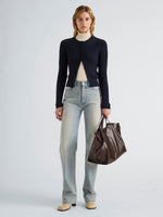 Proenza Schouler Front full length image of model wearing Marci Cardigan in Cable Knit in Navy