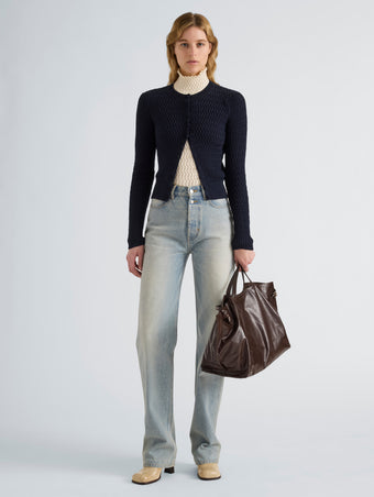 Proenza Schouler Front full length image of model wearing Marci Cardigan in Cable Knit in Navy