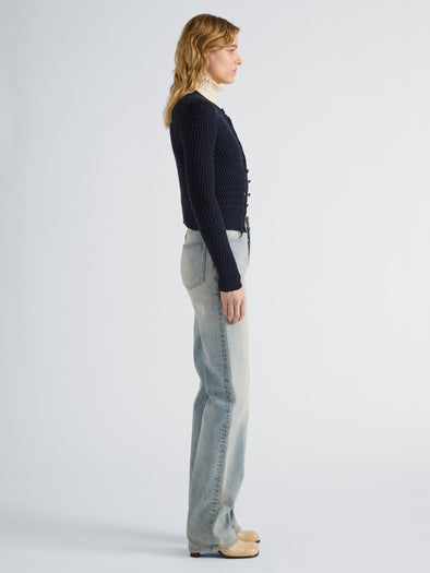 Proenza Schouler Side full length image of model wearing Marci Cardigan in Cable Knit in Navy