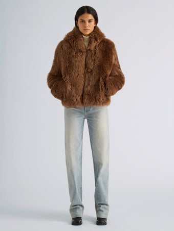 Proenza Schouler Front full length image of model wearing Michelle Hooded Shearling in Caramel