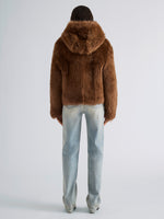 Proenza Schouler Back full length image of model wearing Michelle Hooded Shearling in Caramel