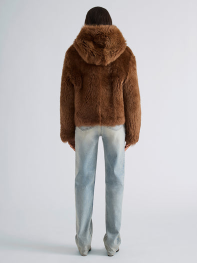 Proenza Schouler Back full length image of model wearing Michelle Hooded Shearling in Caramel