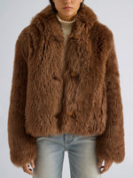 Proenza Schouler Detail image of model wearing Michelle Hooded Shearling in Caramel