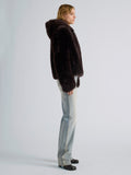 Proenza Schouler Side full length image of model wearing Michelle Hooded Shearling in Coffee