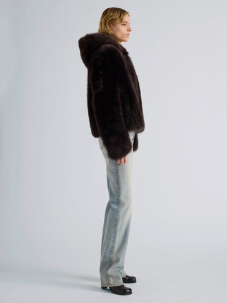 Proenza Schouler Side full length image of model wearing Michelle Hooded Shearling in Coffee