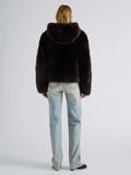 Proenza Schouler Back full length image of model wearing Michelle Hooded Shearling in Coffee