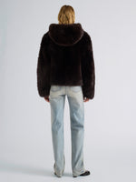 Proenza Schouler Back full length image of model wearing Michelle Hooded Shearling in Coffee