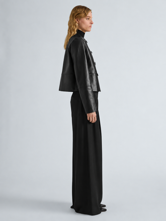 Proenza Schouler Side full length image of model wearing Courtney Jacket in Leather in Black
