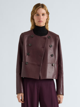 Proenza Schouler Front cropped image of model wearing Courtney Jacket in Leather in Dark Wine