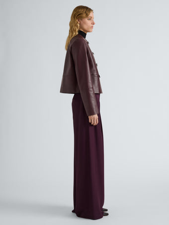 Proenza Schouler Side full length image of model wearing Courtney Jacket in Leather in Dark Wine