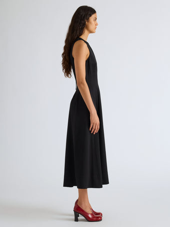 Proenza Schouler Side full length image of model wearing Bronwyn Dress in Merino Wool in Black