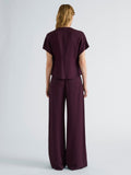 Proenza Schouler Back full length image of model wearing Kat Top in Merino Wool in Malbec