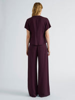 Proenza Schouler Back full length image of model wearing Kat Top in Merino Wool in Malbec