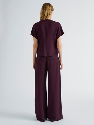 Proenza Schouler Back full length image of model wearing Kat Top in Merino Wool in Malbec