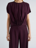 Proenza Schouler Detail image of model wearing Kat Top in Merino Wool in Malbec