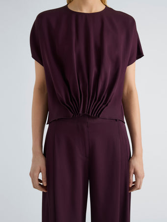 Proenza Schouler Detail image of model wearing Kat Top in Merino Wool in Malbec
