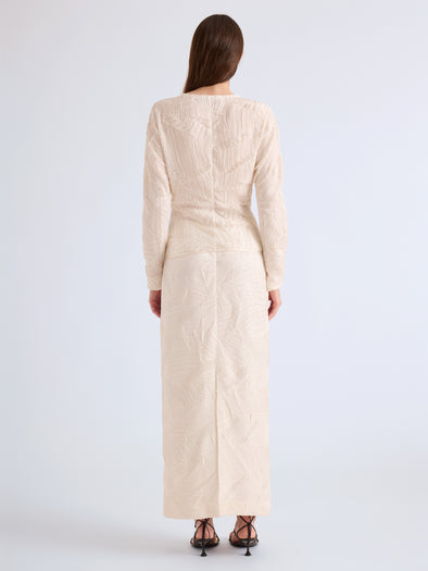 Proenza Schouler Back full length image of model wearing Mila Skirt in Plisse Flou in Gardenia
