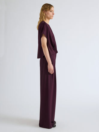 Proenza Schouler Side full length image of model wearing Aria Pant in Merino Wool in Malbec
