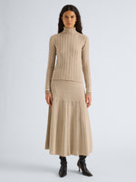Proenza Schouler Front full length image of model wearing Stina Turtleneck in Ladder Stripe in Bronze Cream