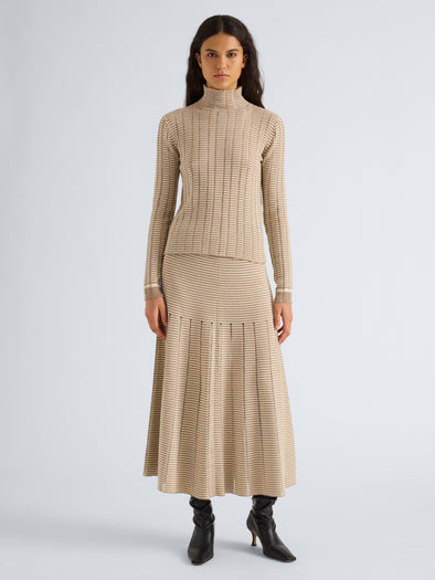 Proenza Schouler Front full length image of model wearing Stina Turtleneck in Ladder Stripe in Bronze Cream