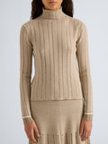 Proenza Schouler Detail image of model wearing Stina Turtleneck in Ladder Stripe in Bronze Cream