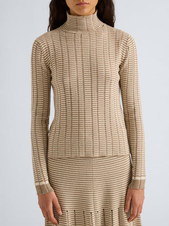 Proenza Schouler Detail image of model wearing Stina Turtleneck in Ladder Stripe in Bronze Cream