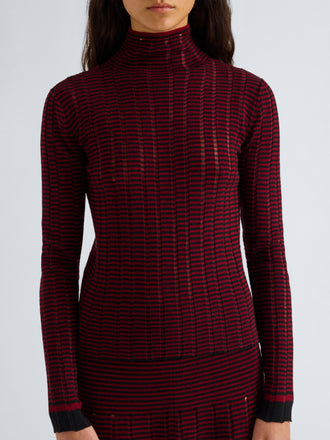 Proenza Schouler Detail image of model wearing Stina Turtleneck in Ladder Stripe in Black Wine