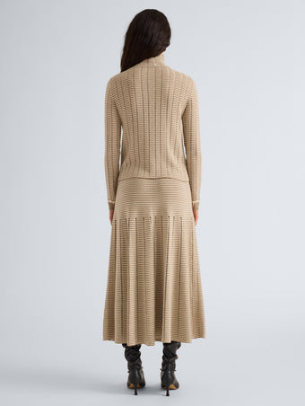 Proenza Schouler Back full length image of model wearing Phyllis Skirt in Ladder Stripe in Bronze Cream