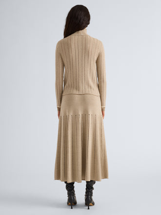 Proenza Schouler Back full length image of model wearing Phyllis Skirt in Ladder Stripe in Bronze Cream