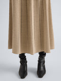Proenza Schouler Detail image of model wearing Phyllis Skirt in Ladder Stripe in Bronze Cream