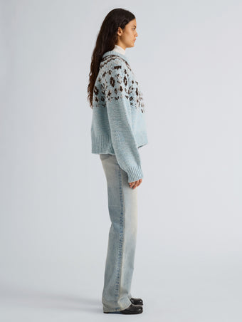 Proenza Schouler Side full length image of model wearing Lizzy Sweater in Fairisle in Pale Blue Multi