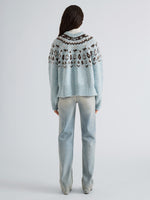 Proenza Schouler Back full length image of model wearing Lizzy Sweater in Fairisle in Pale Blue Multi