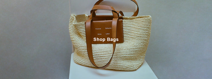 Large Morris Tote in Raffia in ivory sitting on white metal chair