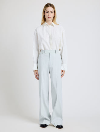 Proenza Schouler Front full length image of model wearing the Weyes Pant in Cotton Viscose Suiting in Pale Grey
