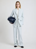 Proenza Schouler Front full length image of model wearing the Weyes Pant in Cotton Viscose Suiting in Pale Grey