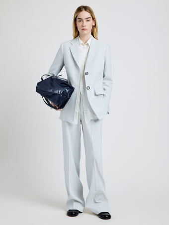 Proenza Schouler Front full length image of model wearing the Weyes Pant in Cotton Viscose Suiting in Pale Grey