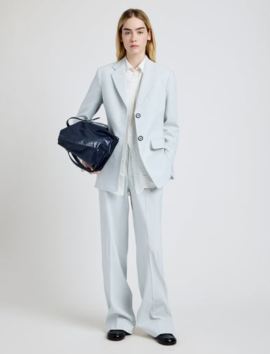 Proenza Schouler Front full length image of model wearing the Weyes Pant in Cotton Viscose Suiting in Pale Grey
