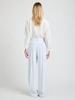 Proenza Schouler Back full length image of model wearing the Weyes Pant in Cotton Viscose Suiting in Pale Grey 