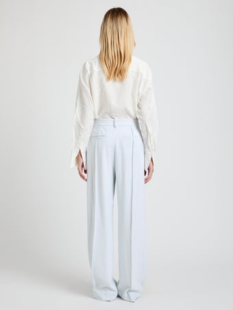 Proenza Schouler Back full length image of model wearing the Weyes Pant in Cotton Viscose Suiting in Pale Grey 