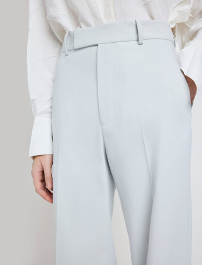 Proenza Schouler Detail image of model wearing the Weyes Pant in Cotton Viscose Suiting in Pale Grey