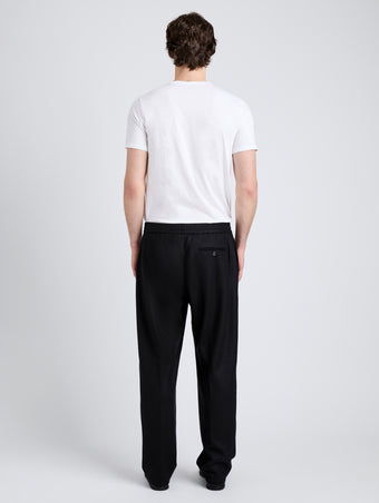 Proenza Schouler Back full length image of model wearing Willem Pant in Jersey Flannel in Black