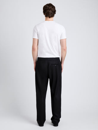 Proenza Schouler Back full length image of model wearing Willem Pant in Jersey Flannel in Black