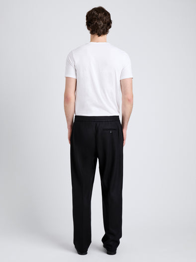 Proenza Schouler Back full length image of model wearing Willem Pant in Jersey Flannel in Black