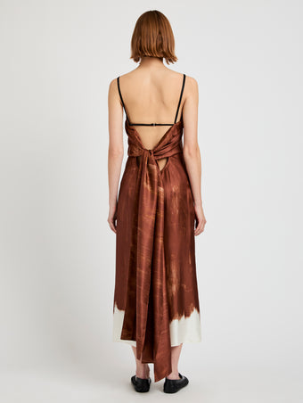 Proenza Schouler back image of model wearing Wilma Dress in Double Printed Silk Twill in sienna multi with waist tied
