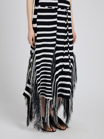 Proenza Schouler detail image of model wearing Yves Dress in Stripe Fringed Knit in black/white