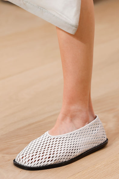 Runway image of the Sqaure Perforated Slippers in cream