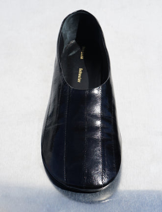Proenza Schouler aerial editorial image of Glove Slippers in BLACK