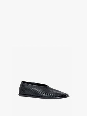Front 3/4 image of the Square Perforated Slippers in black